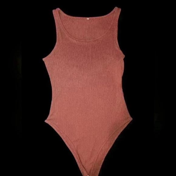 *3 for $25* 4 Medium women bodysuits - Picture 3 of 4